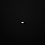 White tilde character centered on black background